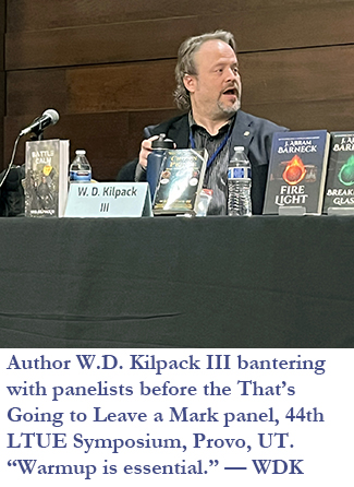 Author W.D. Kilpack III bantering with panelists